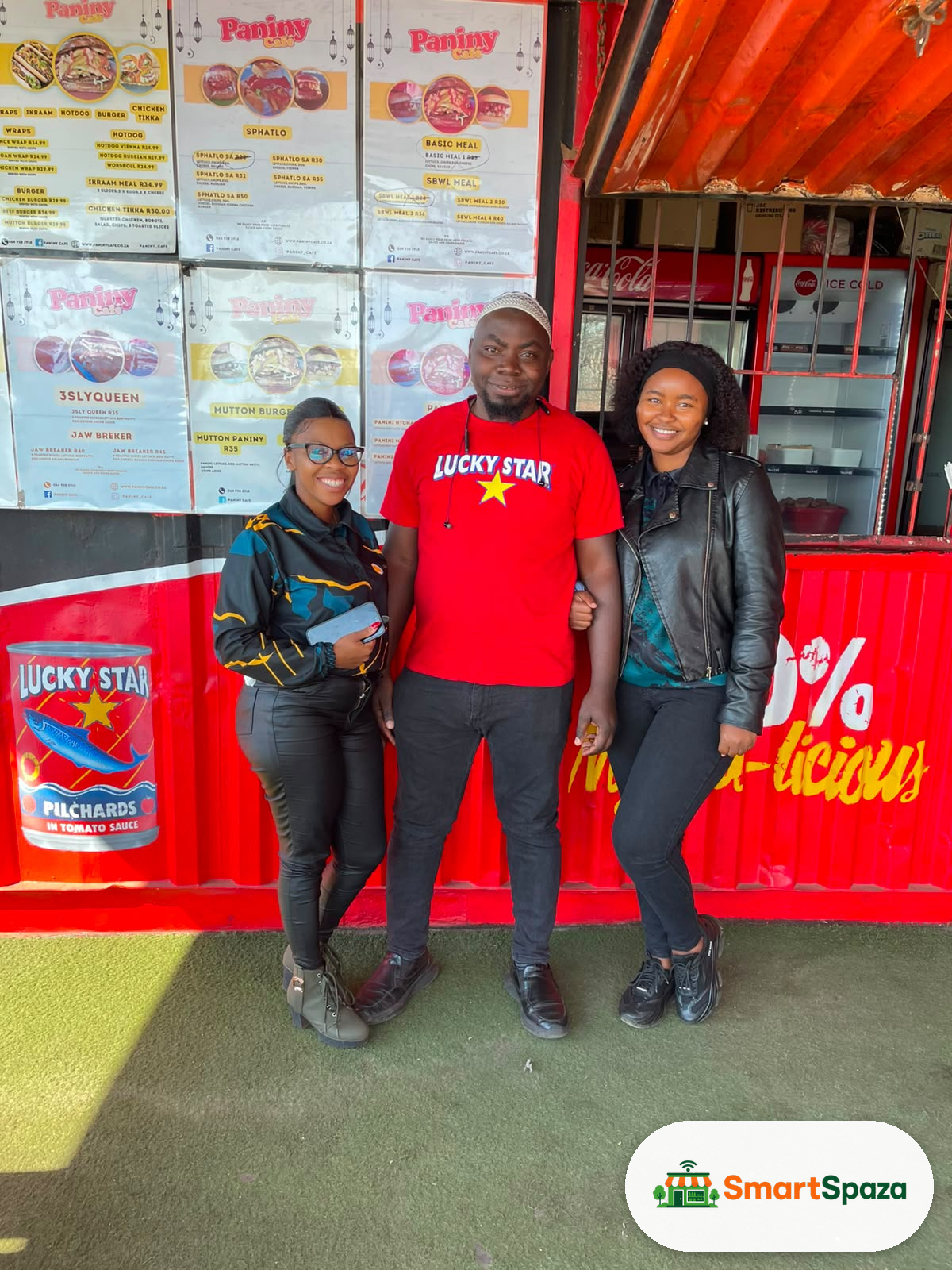 The SmartSpaza team with a spaza shop owner